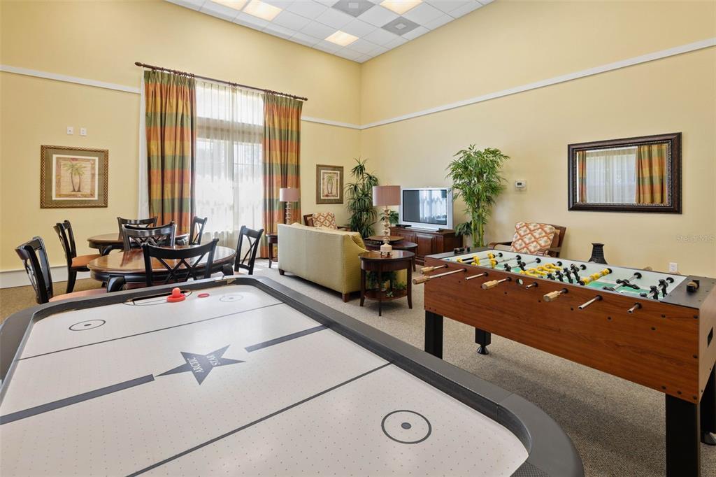 55 Riverview Bend South, Unit 2033 Palm Coast, FL 32137 - Photo 69 of 75 a living room with furniture and large windows