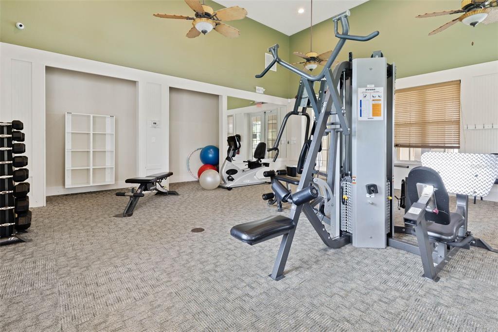 55 Riverview Bend South, Unit 2033 Palm Coast, FL 32137 - Photo 71 of 75 a view of a room with gym equipment
