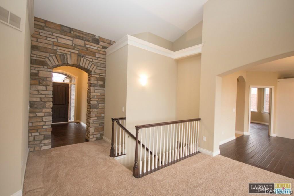 22654 Brantingham Road Macomb, MI 48044 - Photo 9 of 32 6 Lot 92 Bluffs of Beaufait Gia Ranch Spec Home Foyer Stone Entry.jpg