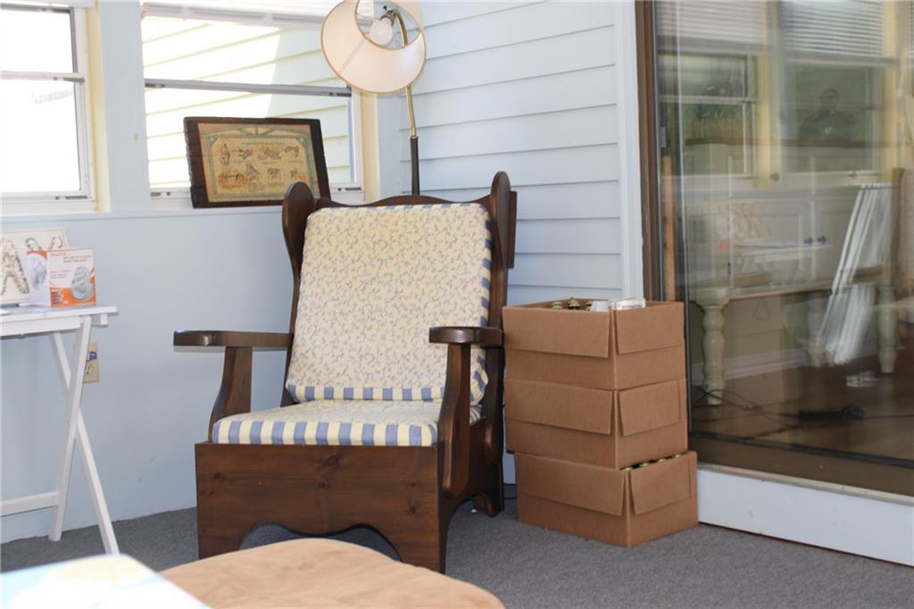 86 Flintlock Village Road, Unit 2 Wells, ME 04090 - Photo 16 of 28 The sunroom is where you'll spend...
