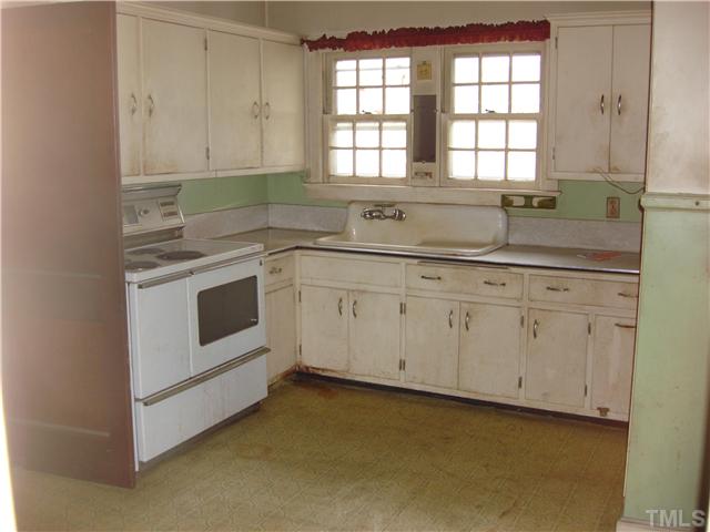 3752 Guess Road Durham, NC 27705 - Photo 3 of 5 Lots of cabinets and Porcelain Sink and Pantry! Can view backyard from Kitchen Window!