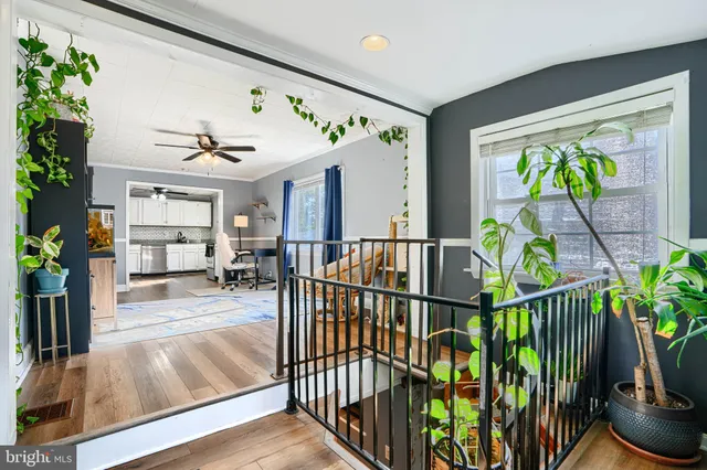 a view of a porch and garden