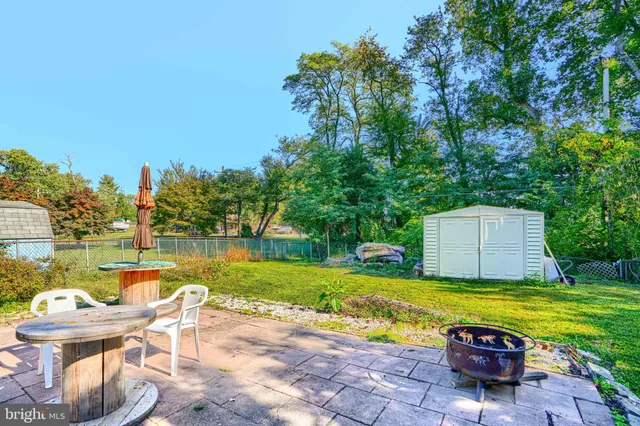 a view of a swimming pool with a lounge chairs