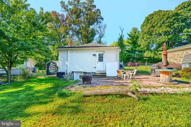 a view of a backyard with a patio