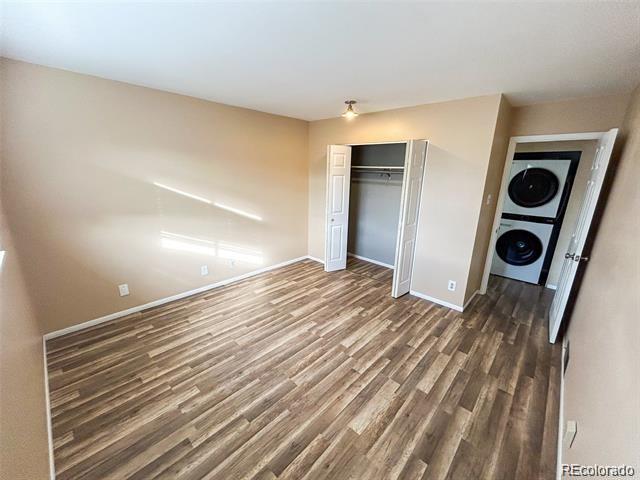 1225 South Oneida Street, Unit 252 Denver, CO 80224 - Photo 17 of 20 a view of a livingroom with wooden floor