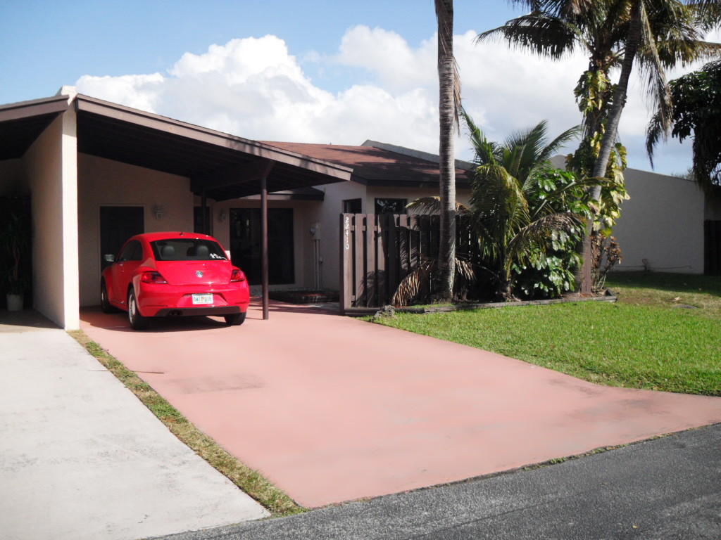 22410 Benidorm Drive Boca Raton, FL 33428 - Photo 1 of 12 Front of Home & Carport