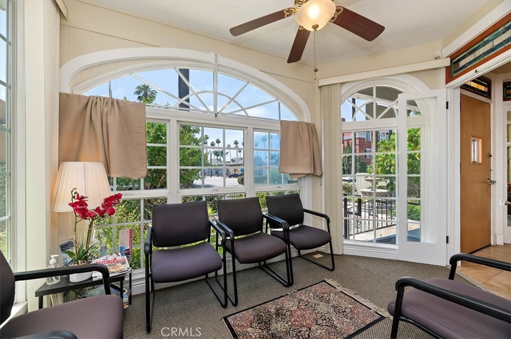 3845 Tenth Street Riverside, CA 92501 - Photo 11 of 45 a living room with furniture and a large window