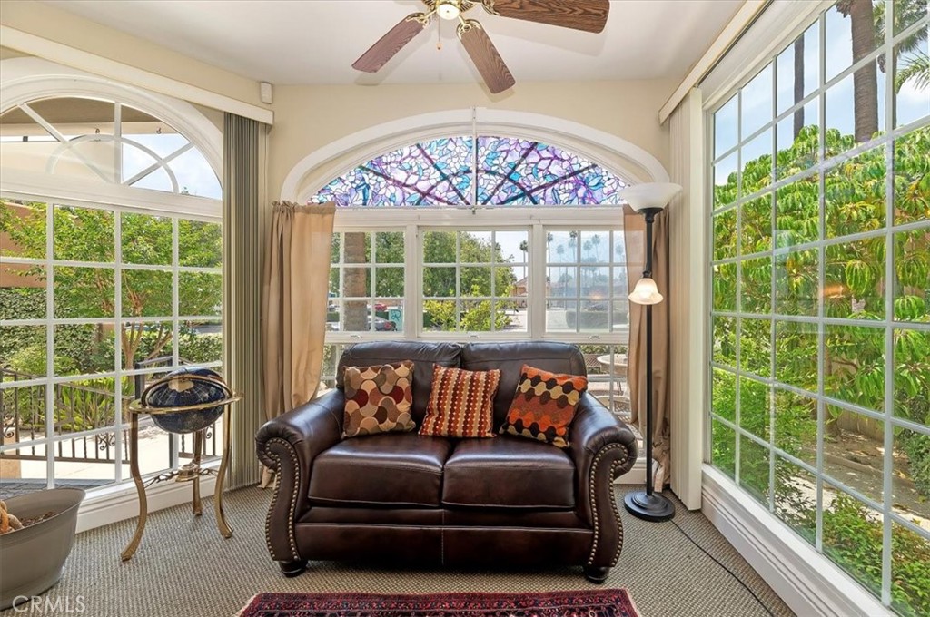 3845 Tenth Street Riverside, CA 92501 - Photo 15 of 45 a bedroom with furniture and a large window