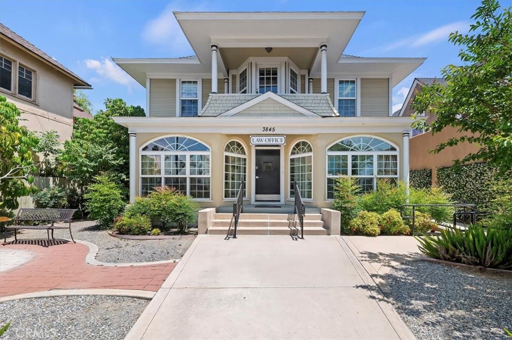 3845 Tenth Street Riverside, CA 92501 - Photo 3 of 45 front view of a brick house with a yard