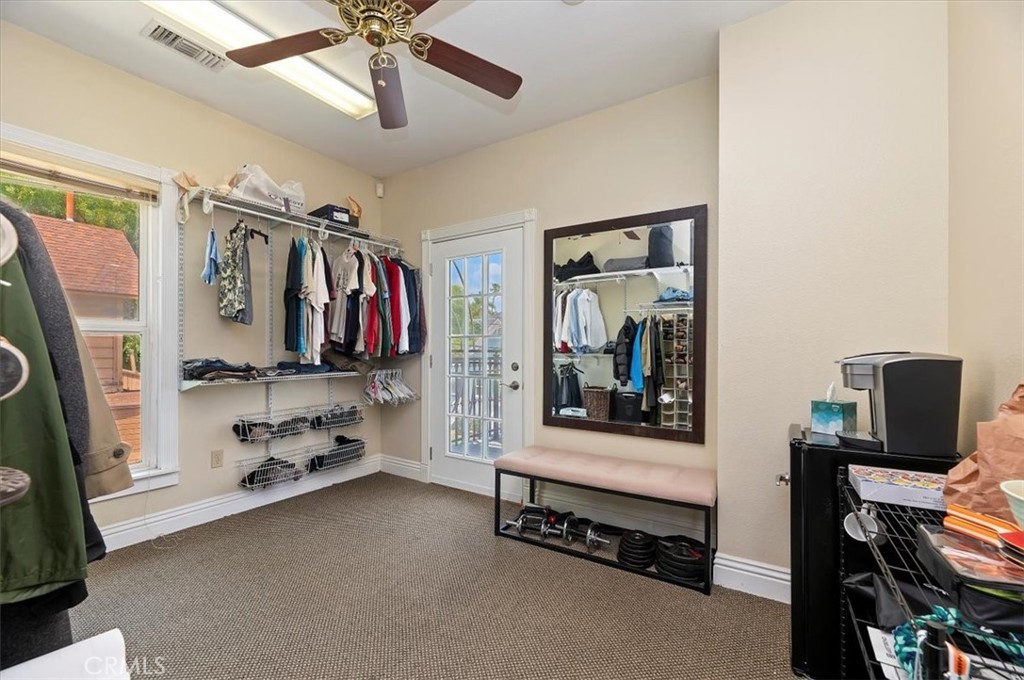 3845 Tenth Street Riverside, CA 92501 - Photo 31 of 45 a view of a livingroom with furniture and a flat screen tv