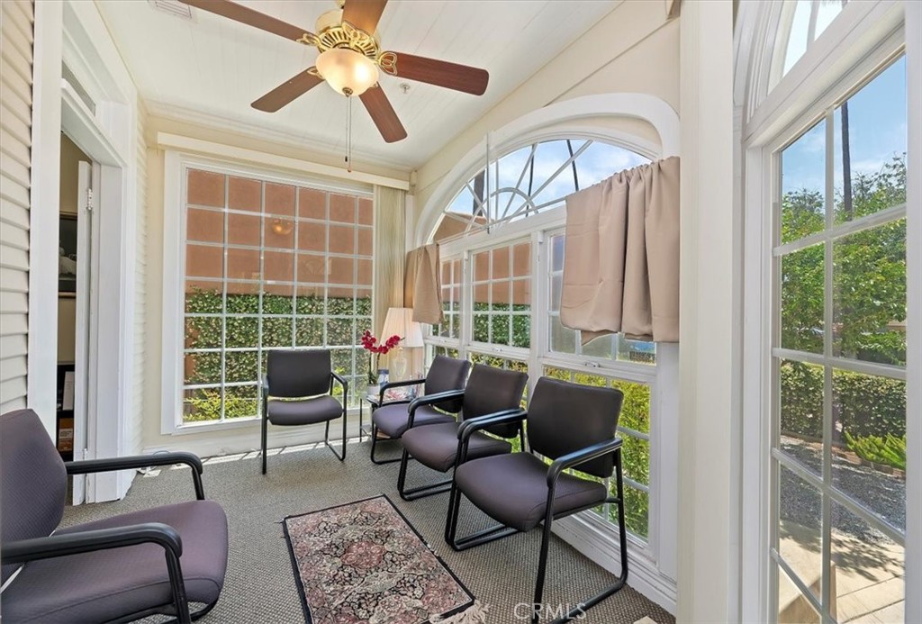 3845 Tenth Street Riverside, CA 92501 - Photo 10 of 45 a living room with furniture and a window