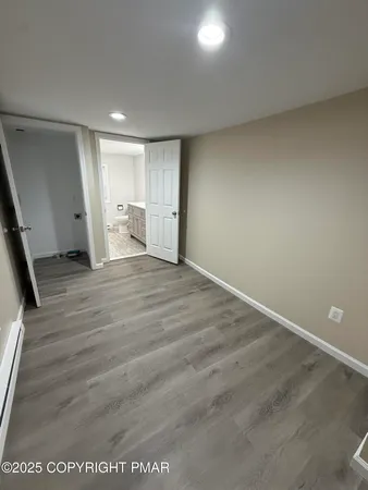 a view of a hallway view with staircase