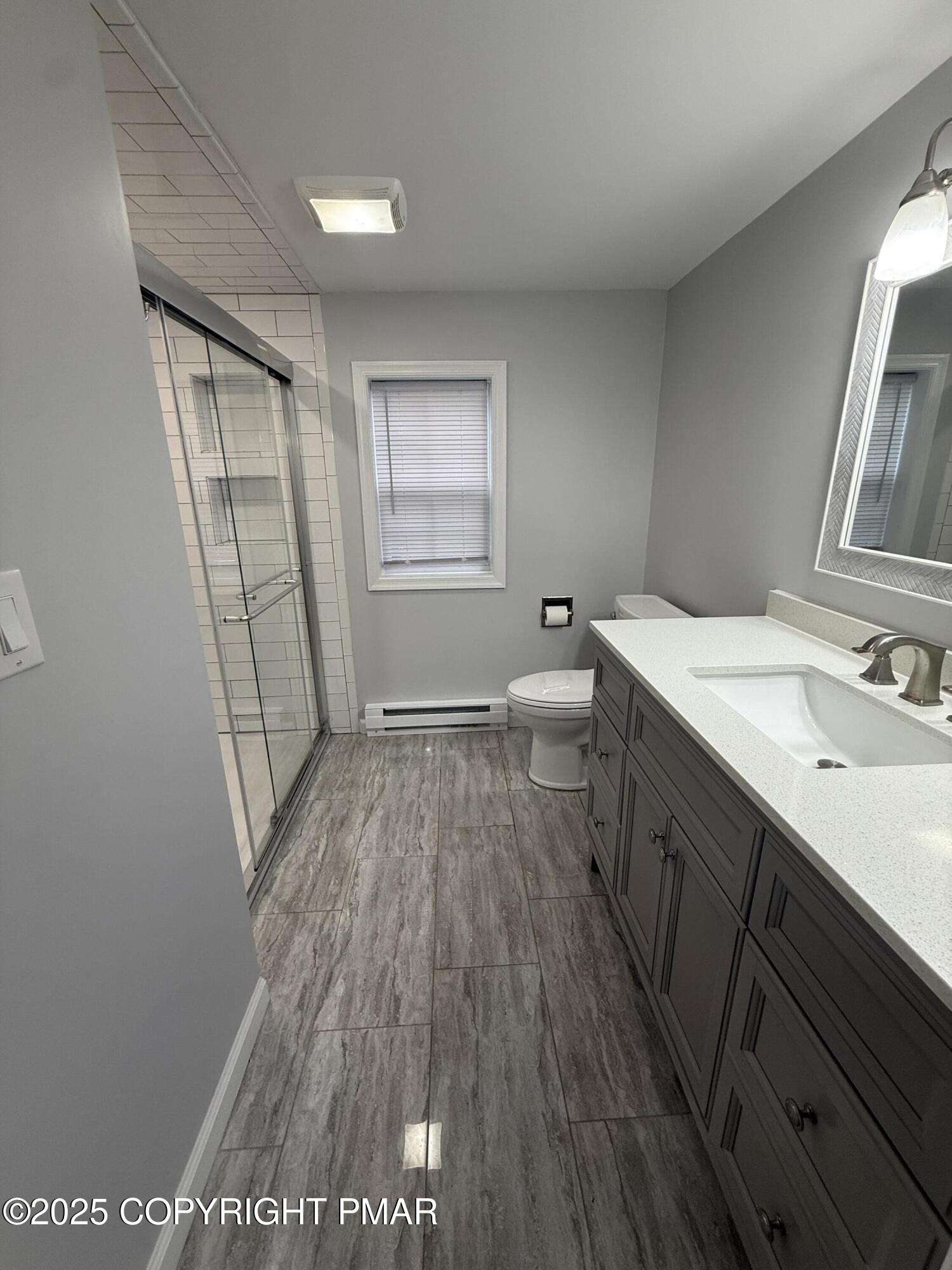 1114 Mill Street, Unit 2 Tobyhanna, PA 18466 - Photo 18 of 21 a bathroom with a sink and a mirror