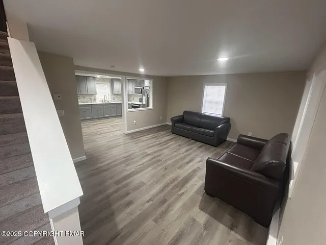 a living room with furniture and a couch