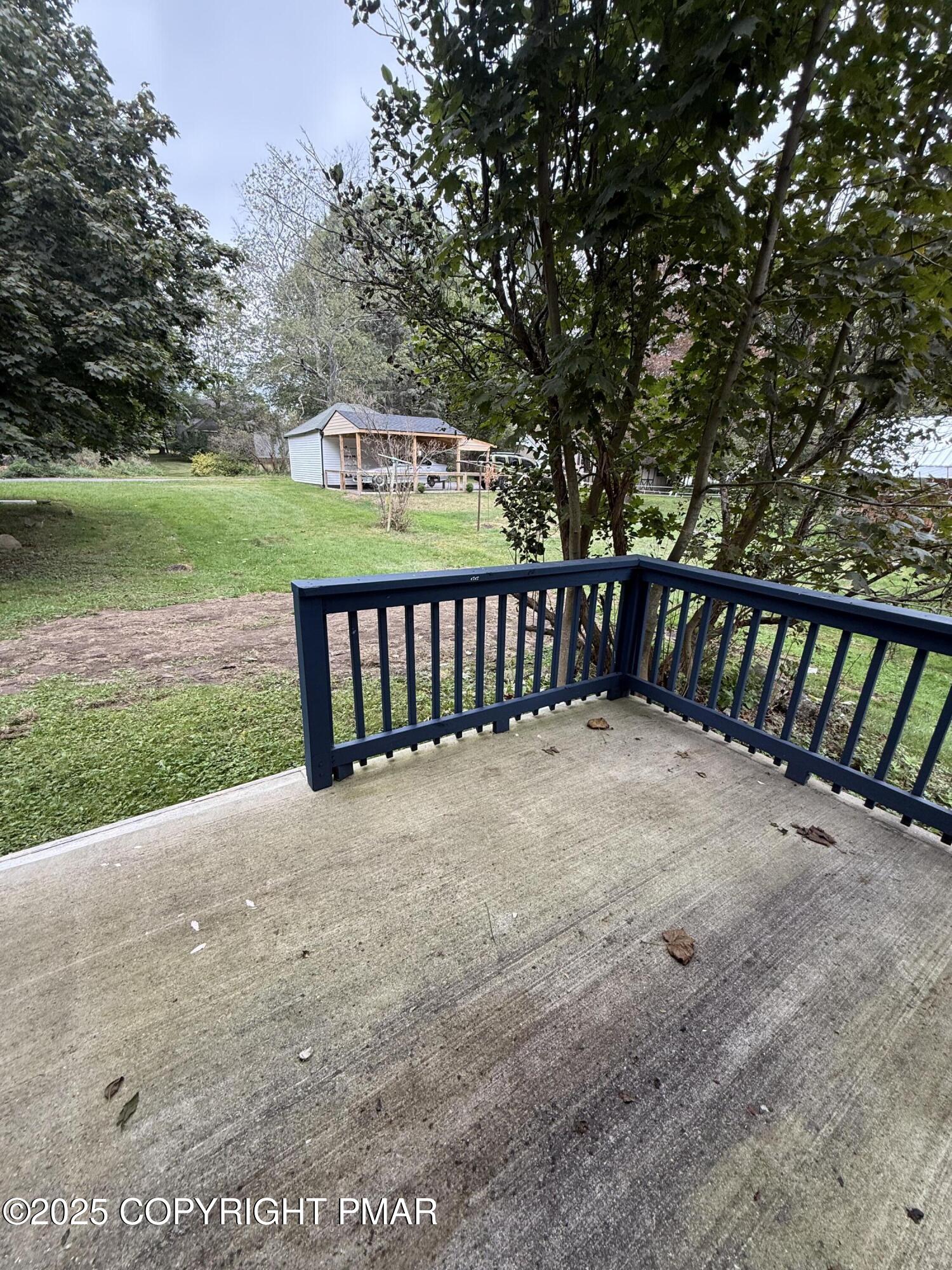 1114 Mill Street, Unit 2 Tobyhanna, PA 18466 - Photo 9 of 21 a view of a backyard with a garden