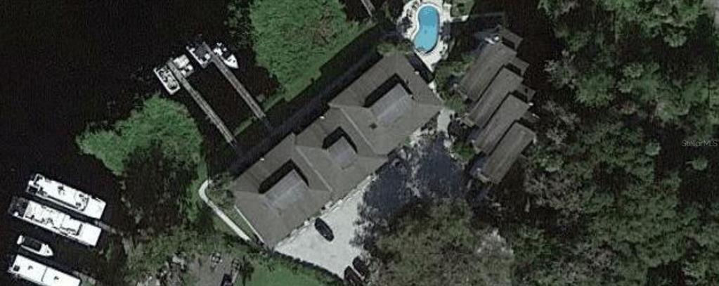 2329 River Ridge Road, Unit 130 DeLand, FL 32720 - Photo 1 of 1 an aerial view of house with outdoor space