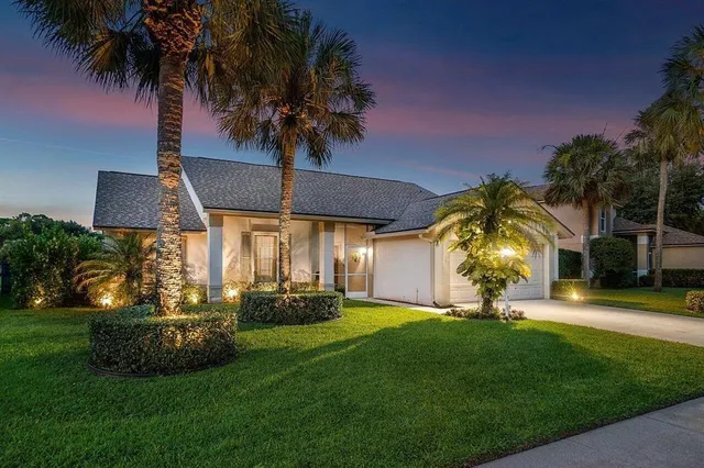a view of a backyard with green space