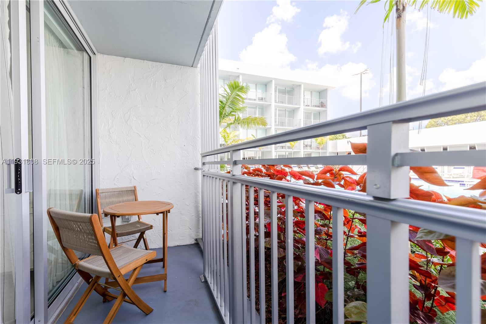 1950 West 49th Street, Unit 155 Hialeah, FL 33012 - Photo 13 of 39 a view of a two chairs in the balcony