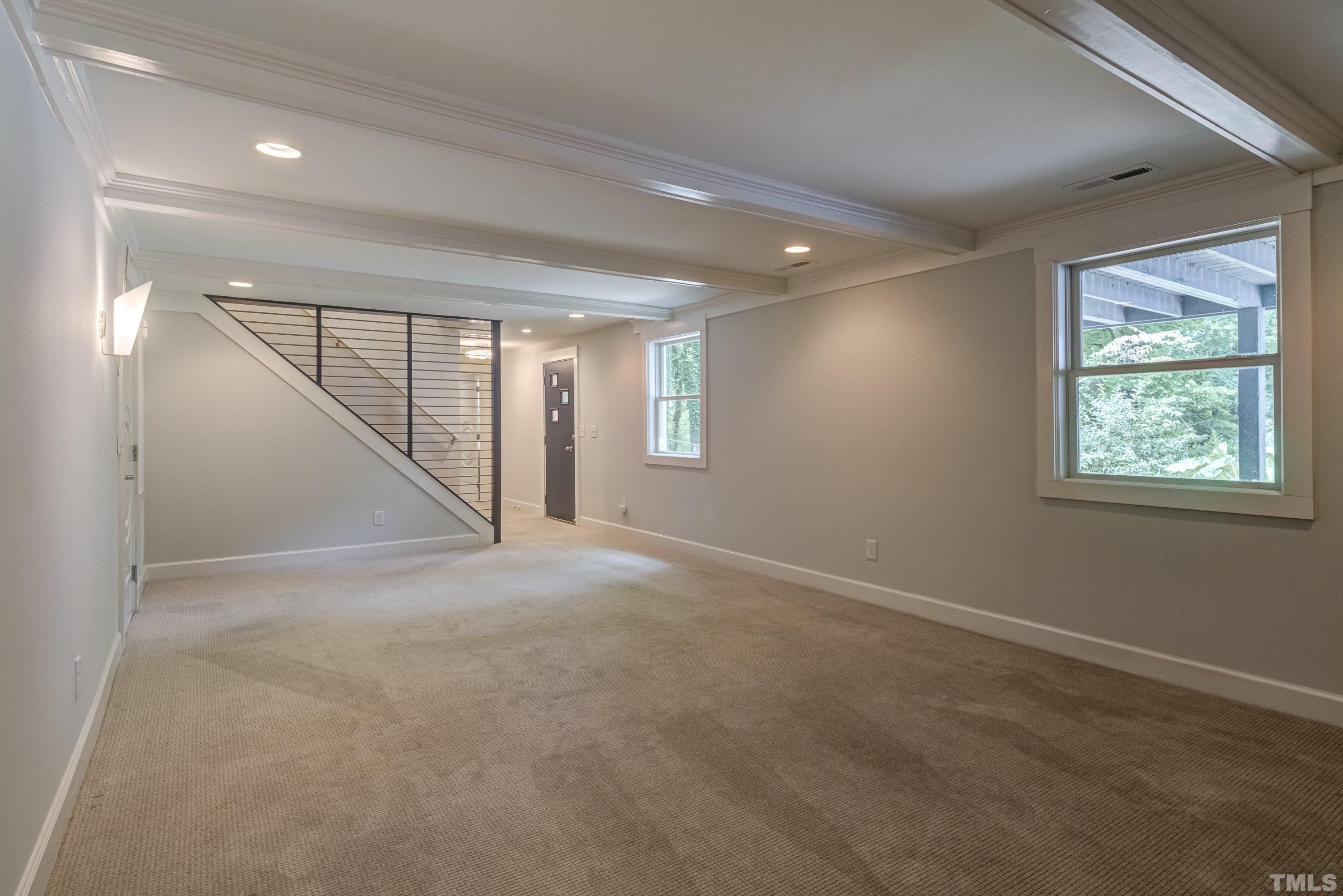 4221 Rowan Street Raleigh, NC 27609 - Photo 45 of 59 a view of an empty room with a window