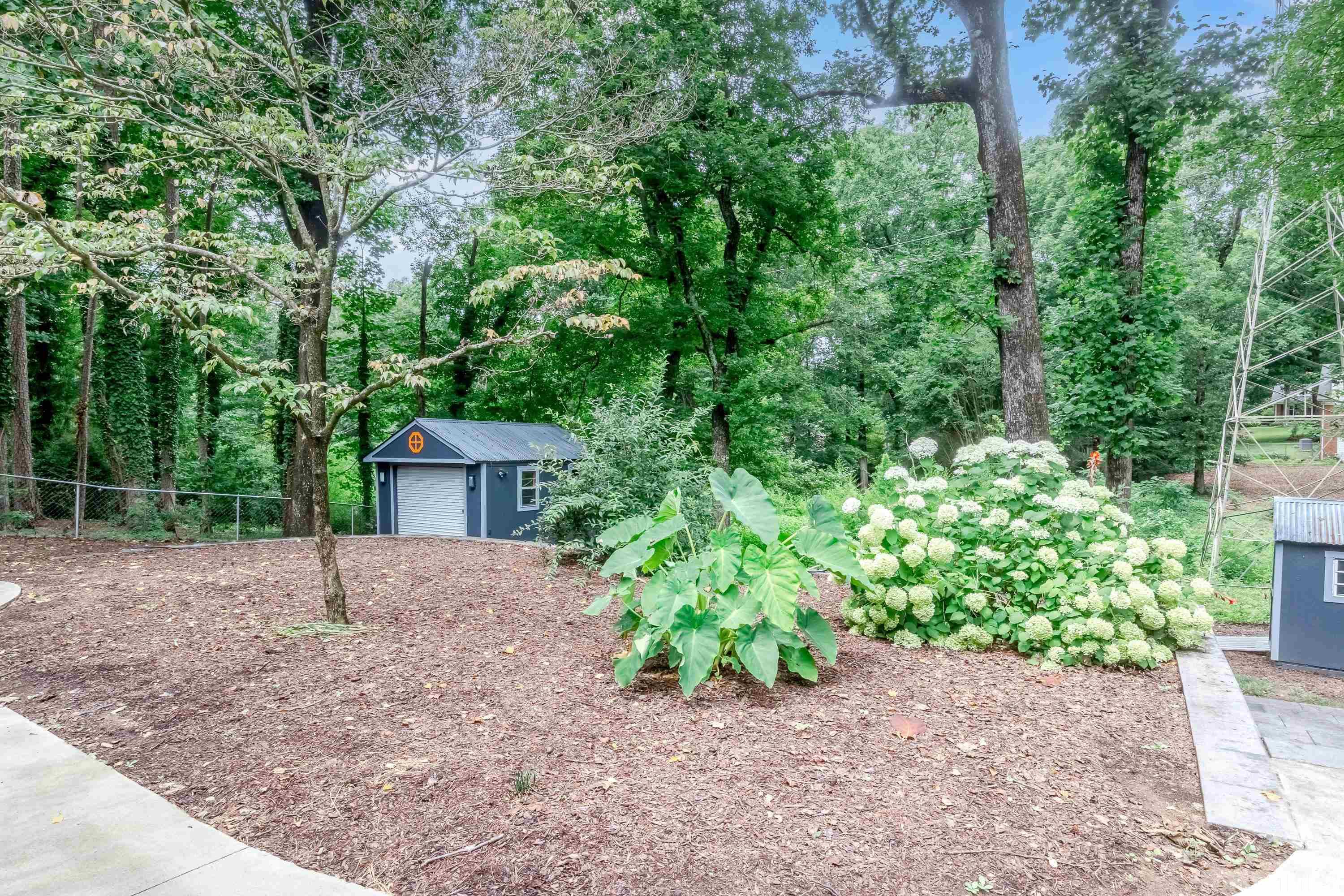 4221 Rowan Street Raleigh, NC 27609 - Photo 58 of 59 front view of a house with a street