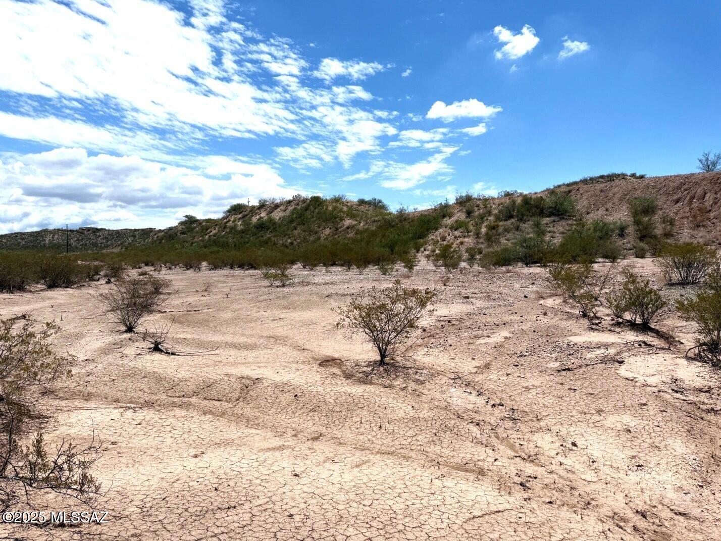 9.93-ac South Lonesome Road Benson, AZ 85602 - Photo 15 of 15 Flat looking toward hill top pad.