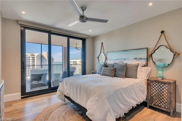 a bedroom with a bed and a television