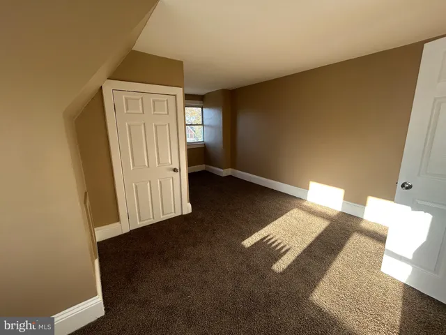 an entryway with a workspace