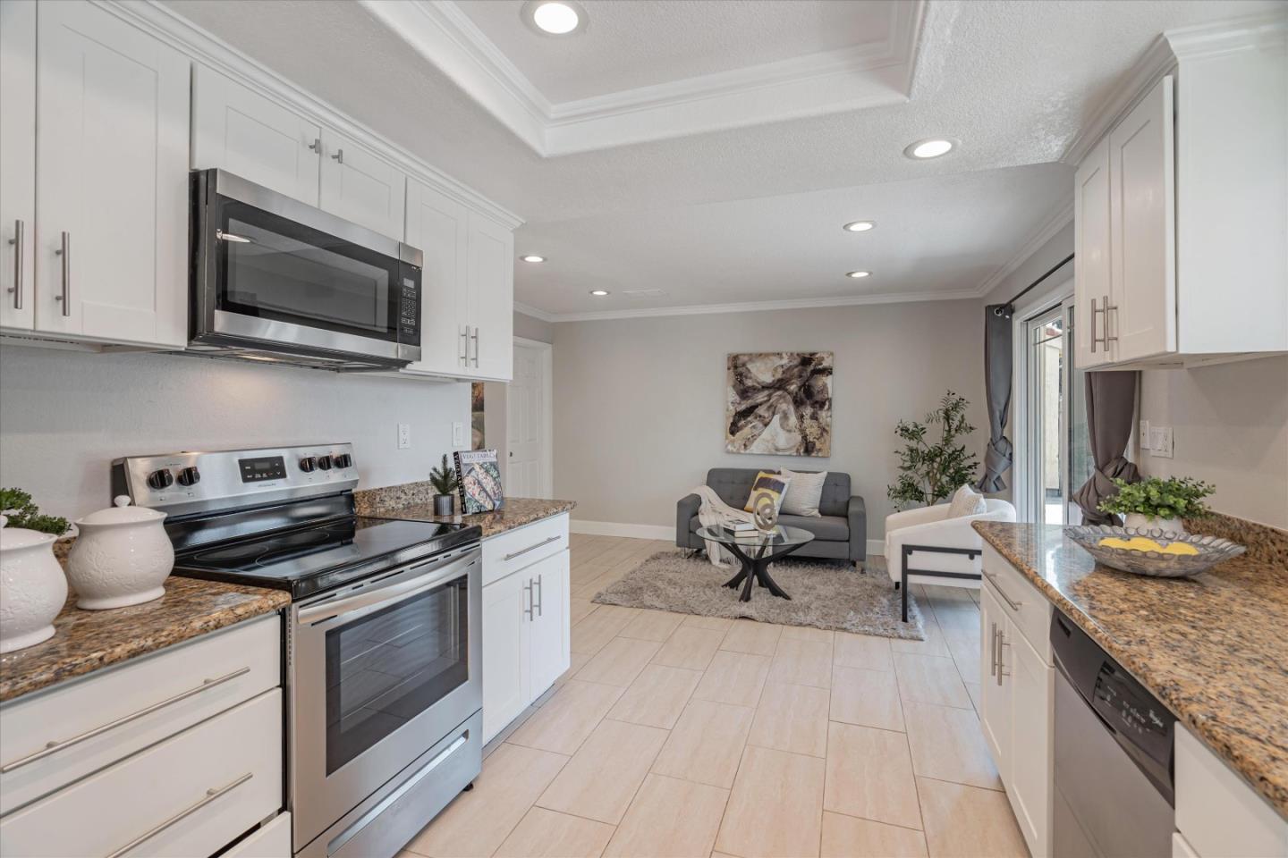 1933 Edgestone Circle San Jose, CA 95122 - Photo 11 of 40 a open kitchen with stainless steel appliances granite countertop a sink and a stove