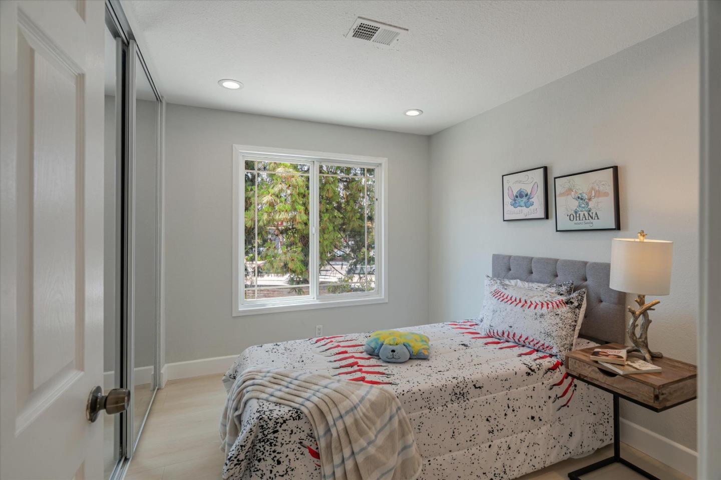 1933 Edgestone Circle San Jose, CA 95122 - Photo 19 of 40 a bedroom with a bed and a window