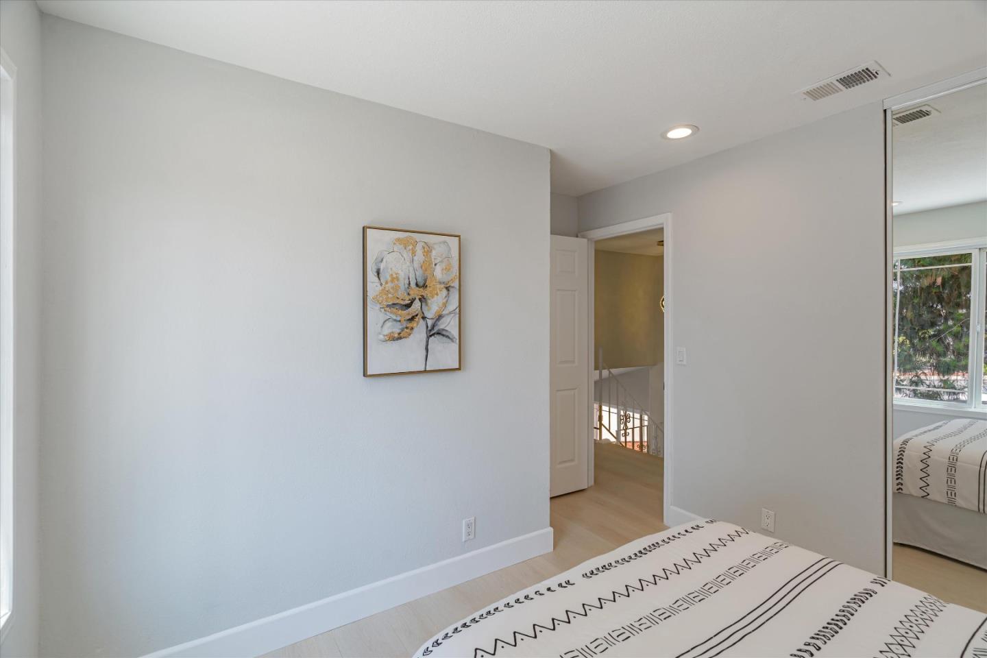 1933 Edgestone Circle San Jose, CA 95122 - Photo 24 of 40 a bedroom with a bed and a view of bathroom