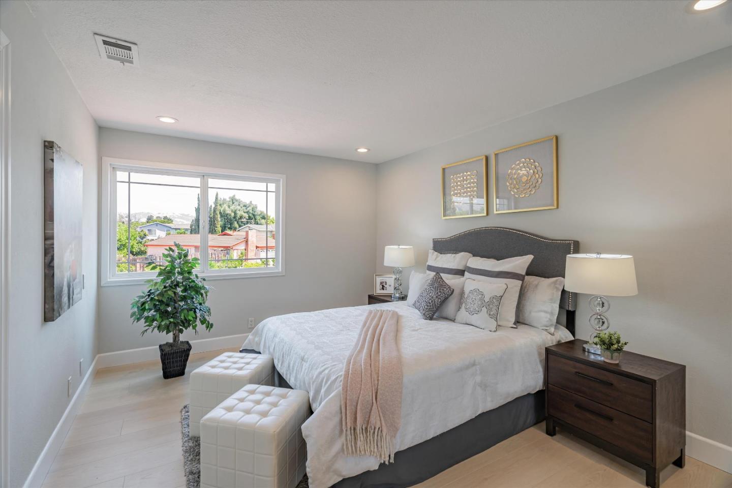 1933 Edgestone Circle San Jose, CA 95122 - Photo 25 of 40 a bedroom with a bed and a potted plant