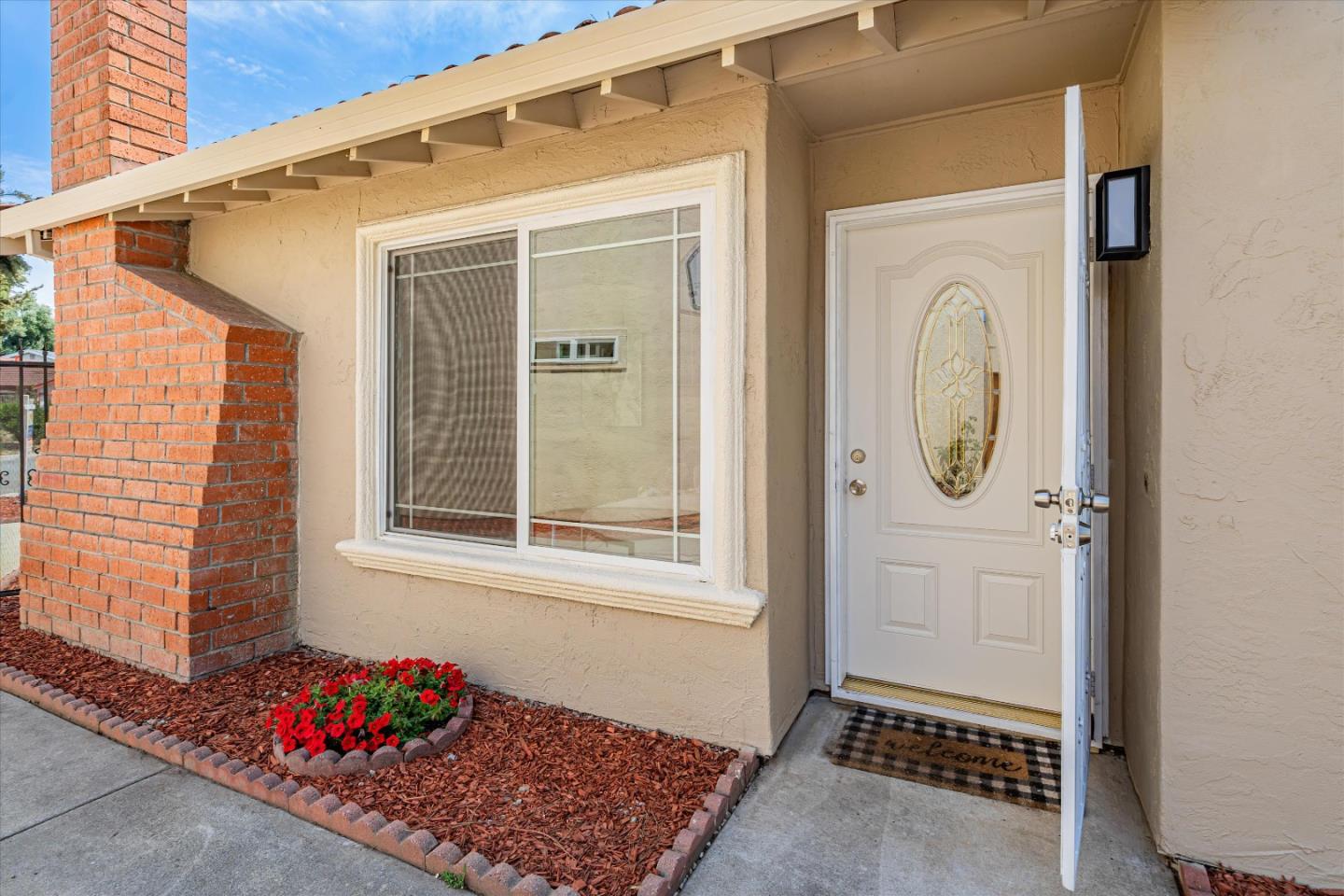 1933 Edgestone Circle San Jose, CA 95122 - Photo 4 of 40 a view of a door and a window
