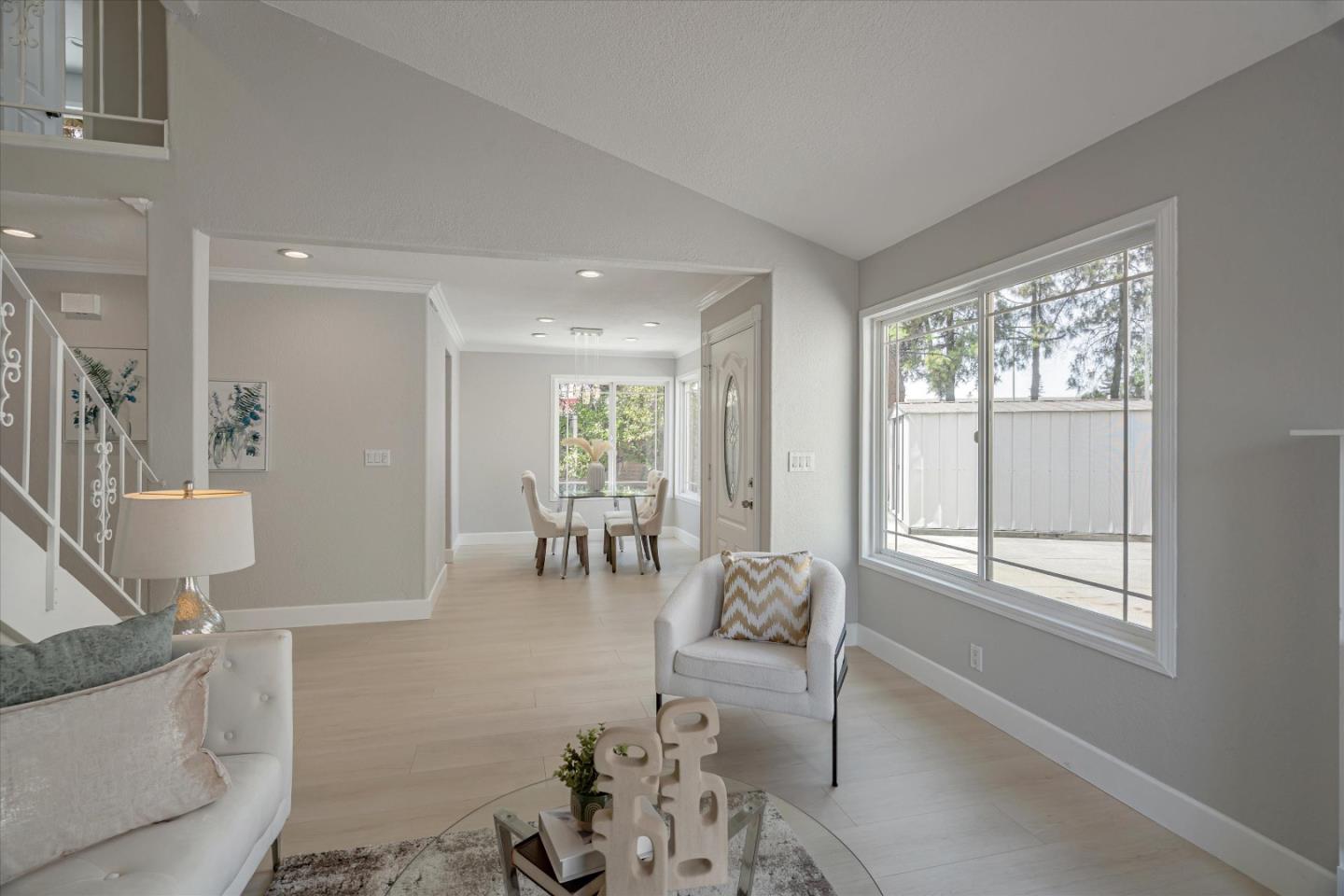 1933 Edgestone Circle San Jose, CA 95122 - Photo 7 of 40 a living room with furniture and a large window