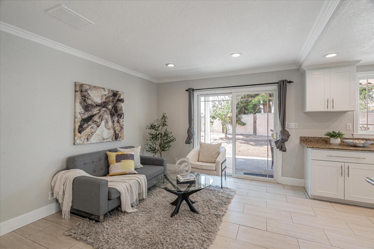 1933 Edgestone Circle San Jose, CA 95122 - Photo 9 of 40 a bedroom with furniture and a large window