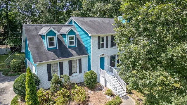front view of a house with a yard