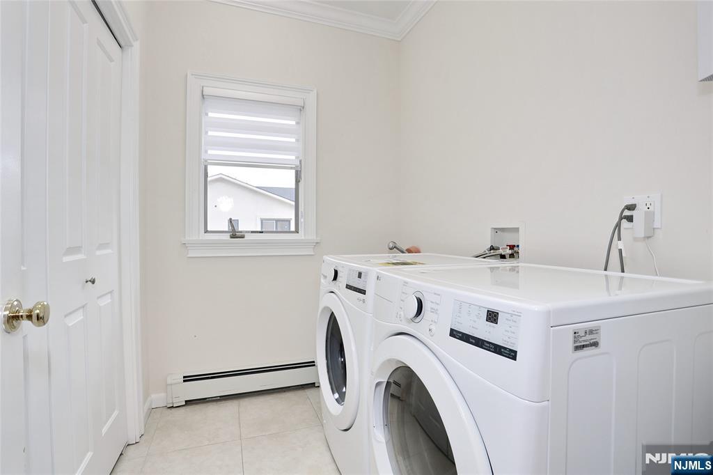 65 Ross Avenue Demarest, NJ 07627 - Photo 21 of 48 a utility room with dryer and washer