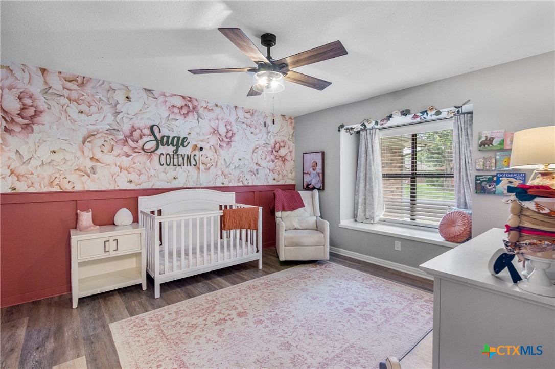 119 Larimore Street Victoria, TX 77904 - Photo 12 of 19 a bed room with a bed and a window
