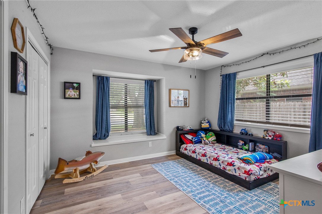 119 Larimore Street Victoria, TX 77904 - Photo 13 of 19 a living room with furniture and a large window
