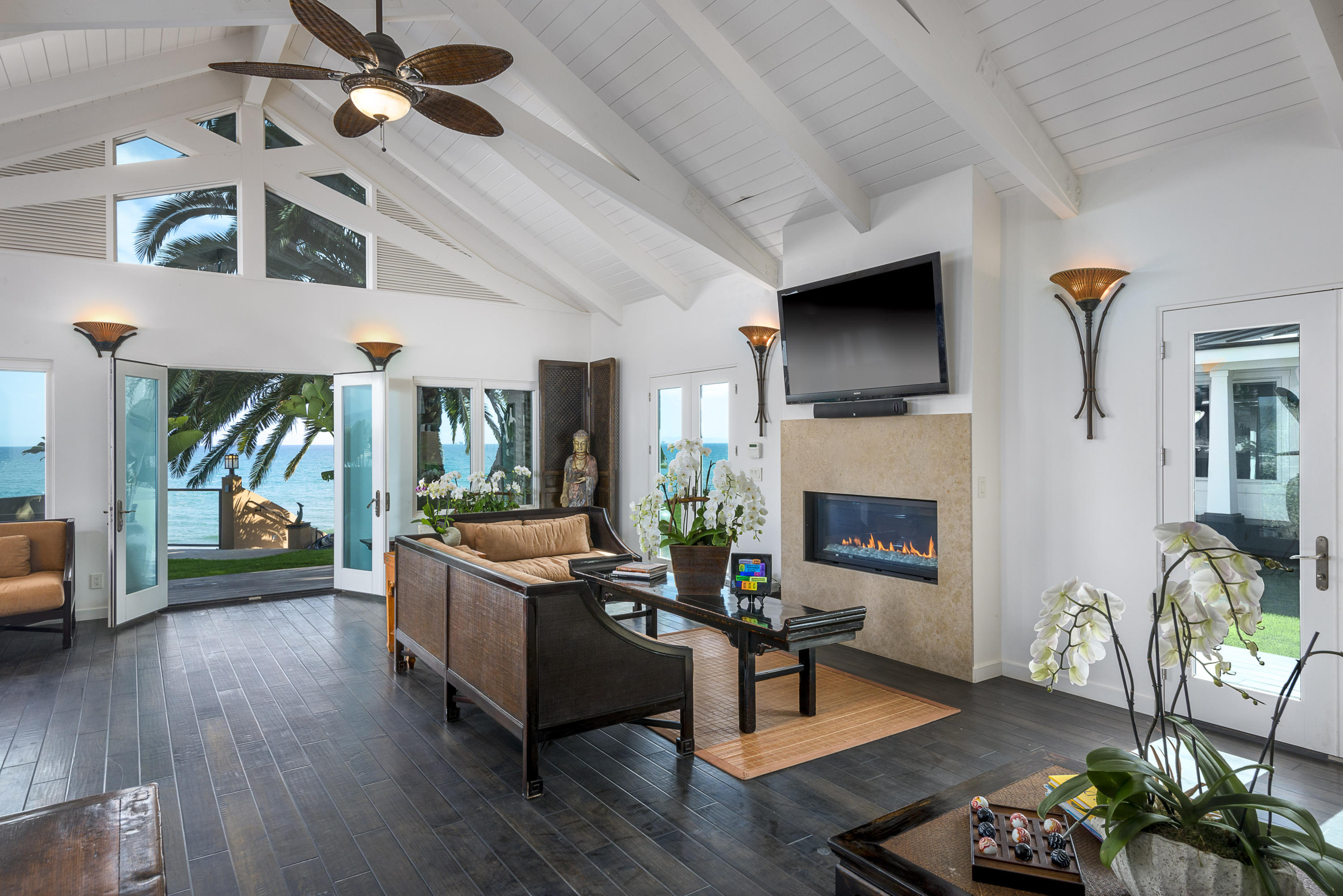 1491 Edgecliff Lane Montecito, CA 93108 - Photo 14 of 28 a living room with furniture or fireplace and a wooden floor