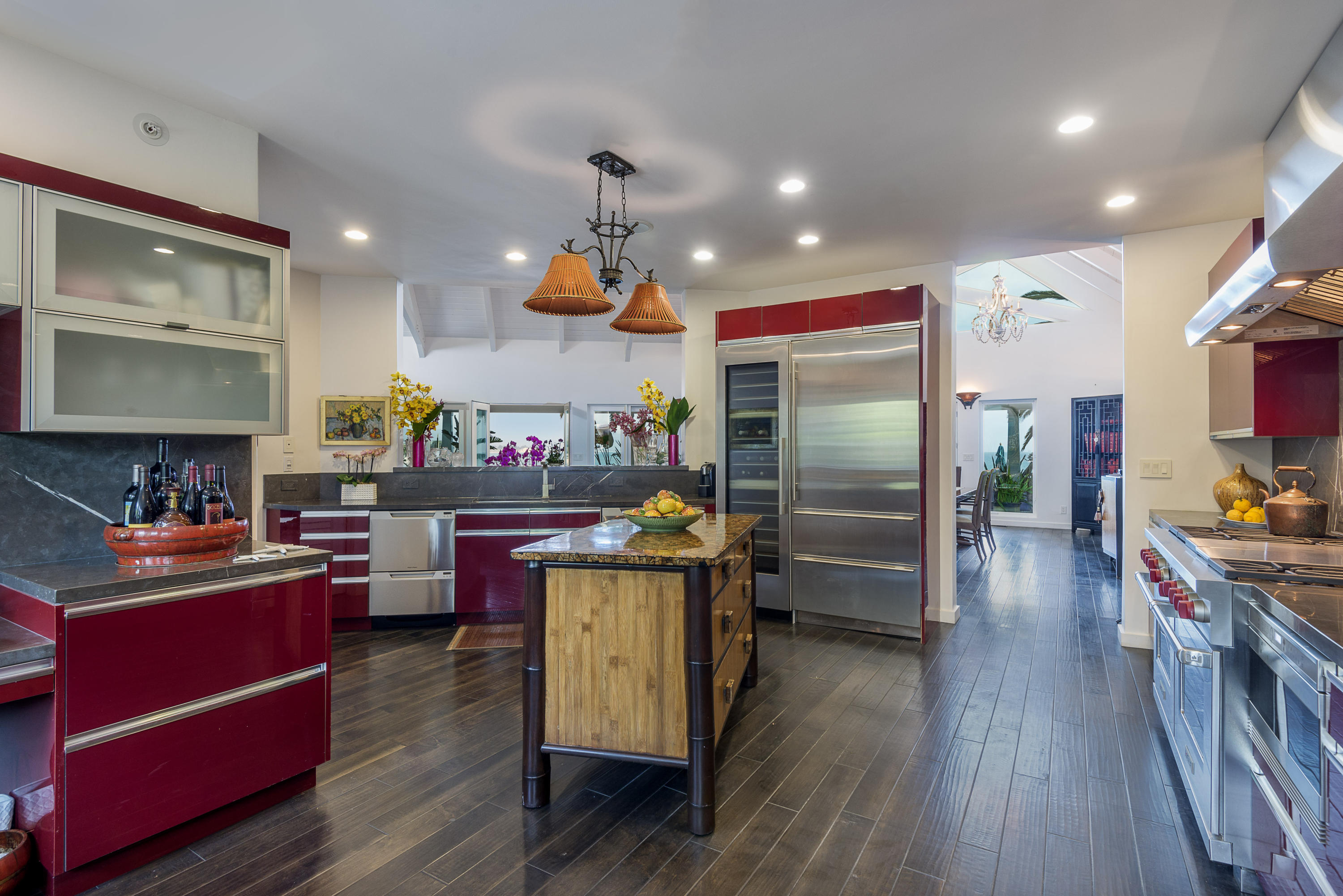 1491 Edgecliff Lane Montecito, CA 93108 - Photo 15 of 28 a kitchen view with wooden floor and stainless steel appliances