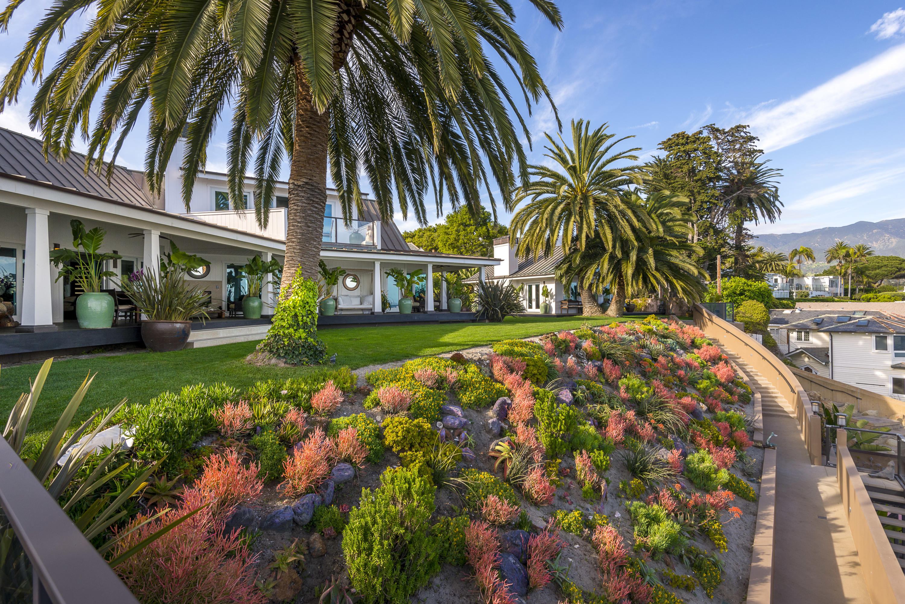 1491 Edgecliff Lane Montecito, CA 93108 - Photo 3 of 28 a view of a multi story building with a yard
