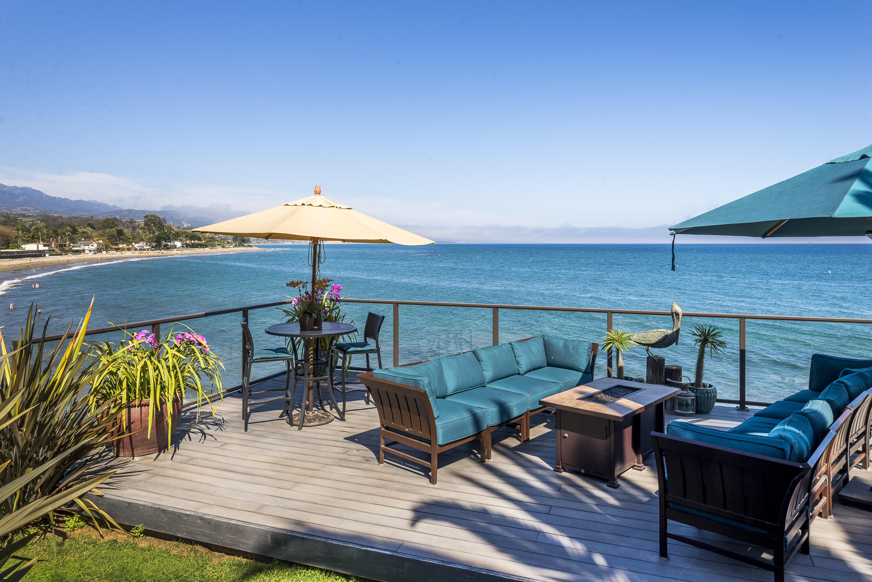 1491 Edgecliff Lane Montecito, CA 93108 - Photo 4 of 28 a backyard of a house with table and chairs