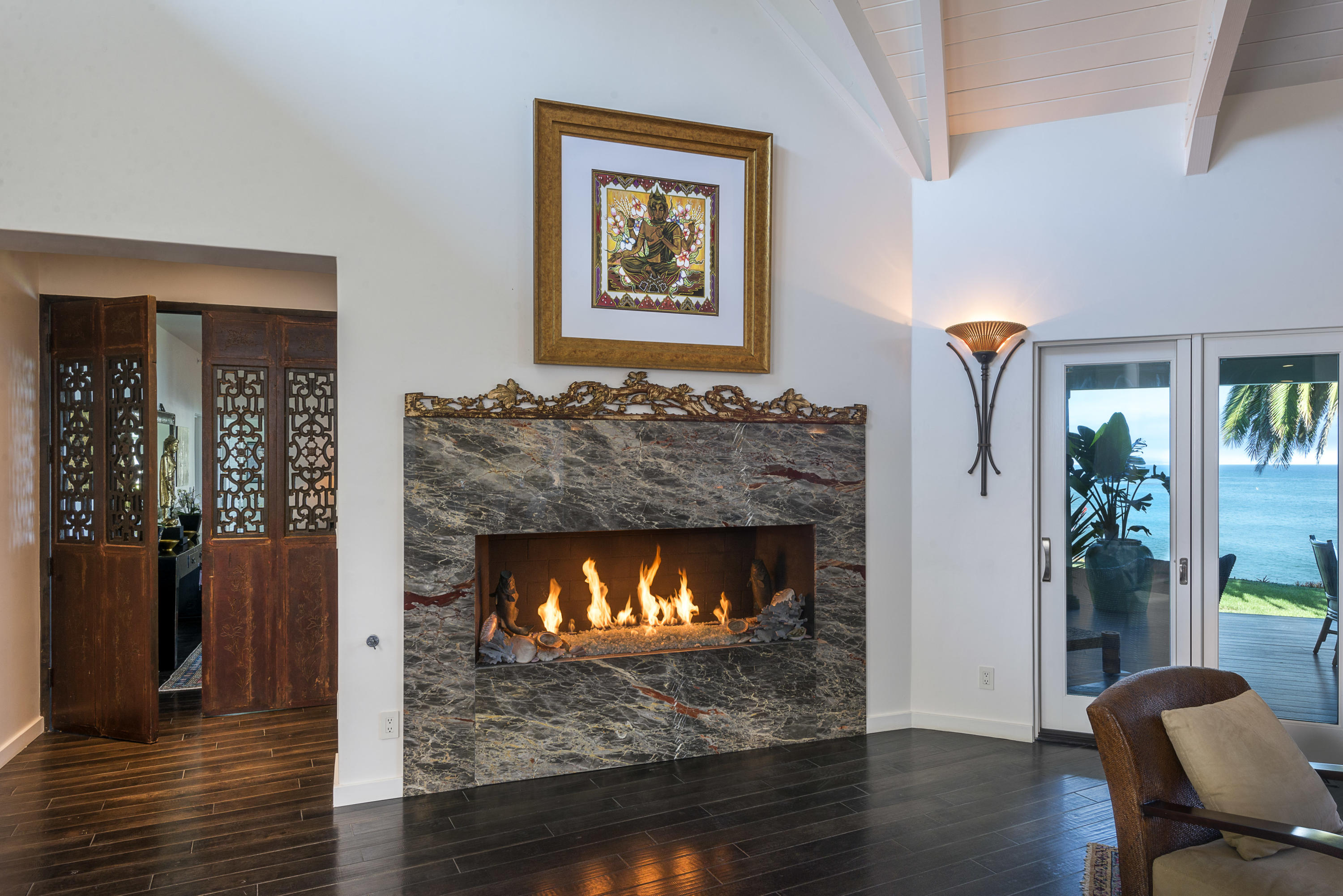 1491 Edgecliff Lane Montecito, CA 93108 - Photo 7 of 28 a living room with furniture and a fireplace