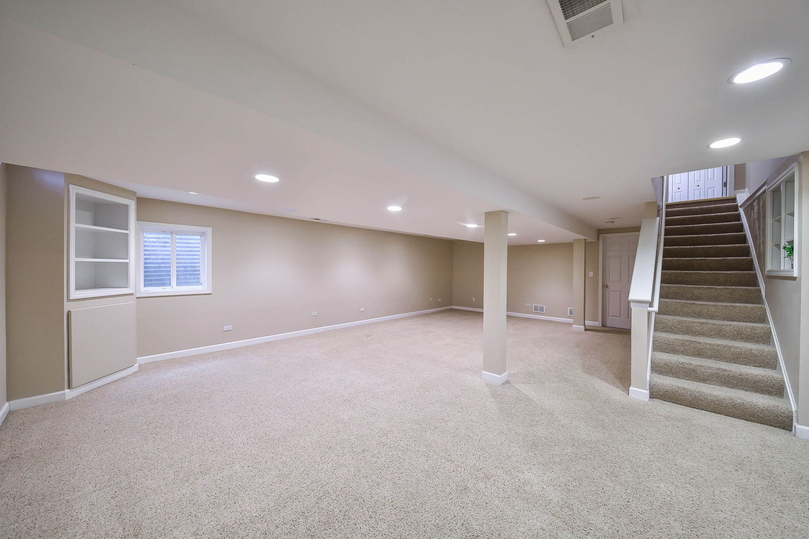 1772 Ellington Drive Aurora, IL 60503 - Photo 21 of 24 a view of an empty room with stairs
