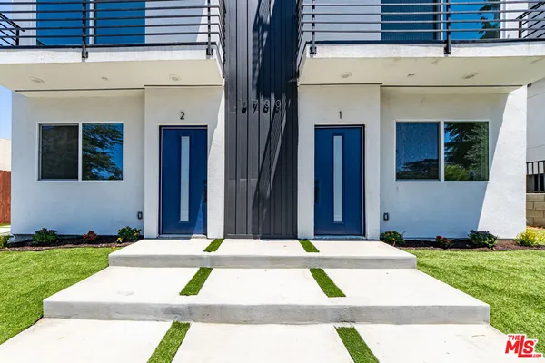 a view of outdoor space yard and front view of a house