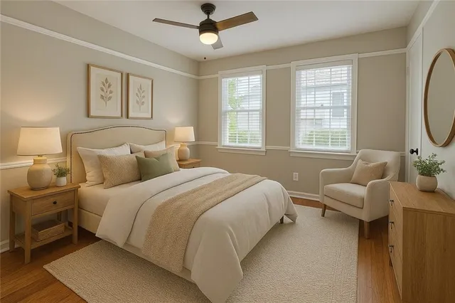a bedroom with a bed dresser and a window