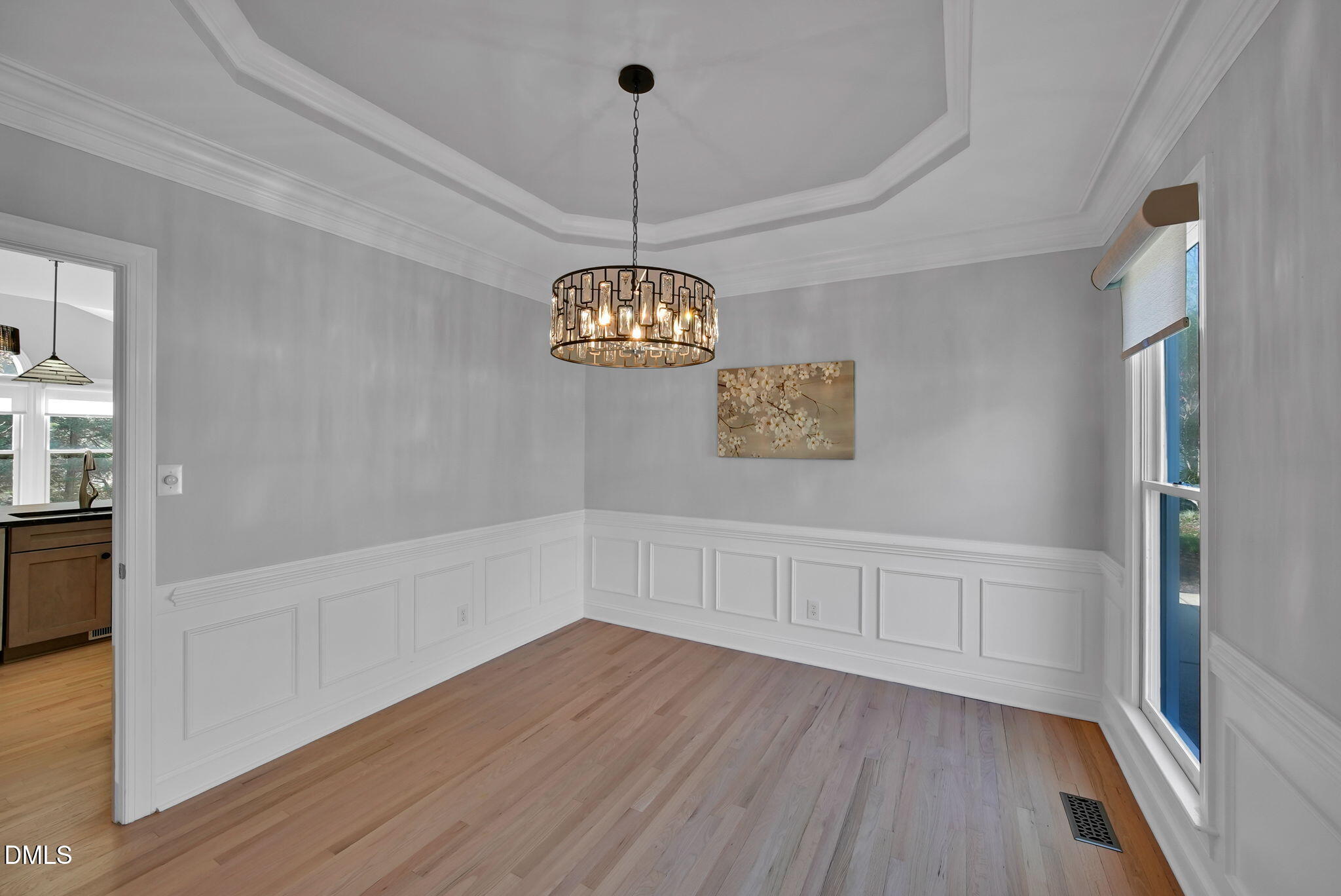 8005 Looking Glass Court Raleigh, NC 27612 - Photo 20 of 75 a view of an entryway with wooden floor