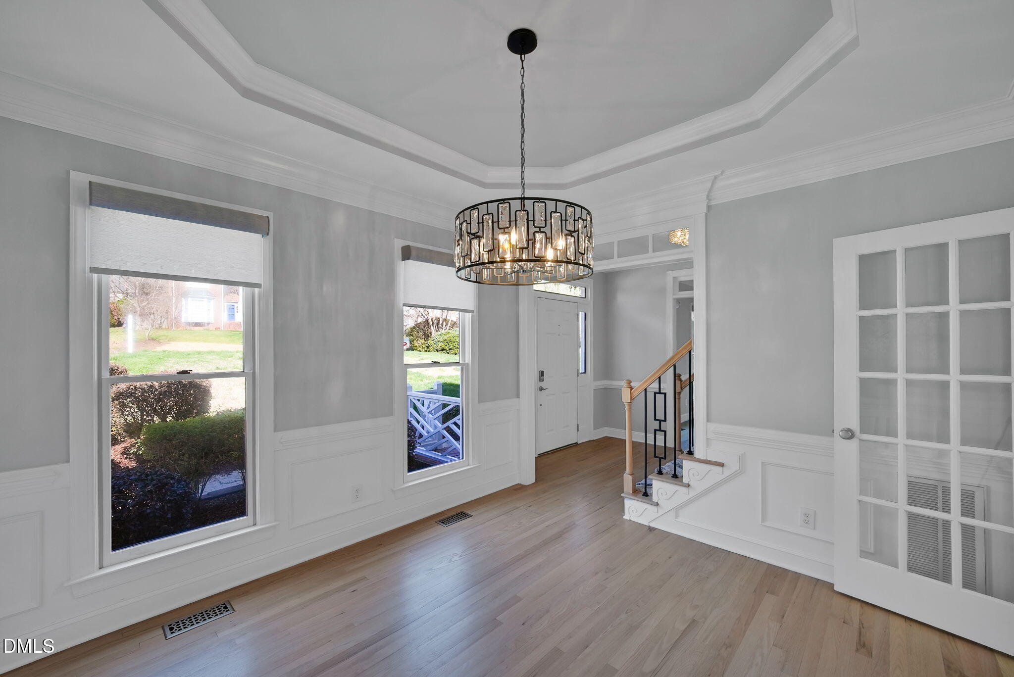 8005 Looking Glass Court Raleigh, NC 27612 - Photo 21 of 75 a view of a room with gym equipment and wooden floor
