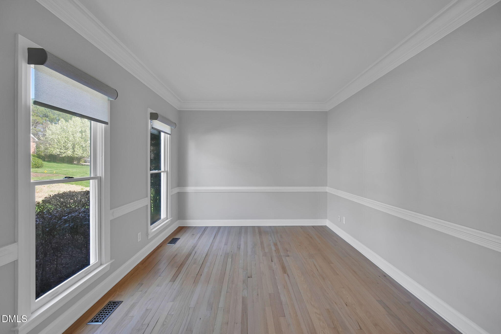 8005 Looking Glass Court Raleigh, NC 27612 - Photo 27 of 75 a view of a room with wooden floors and window