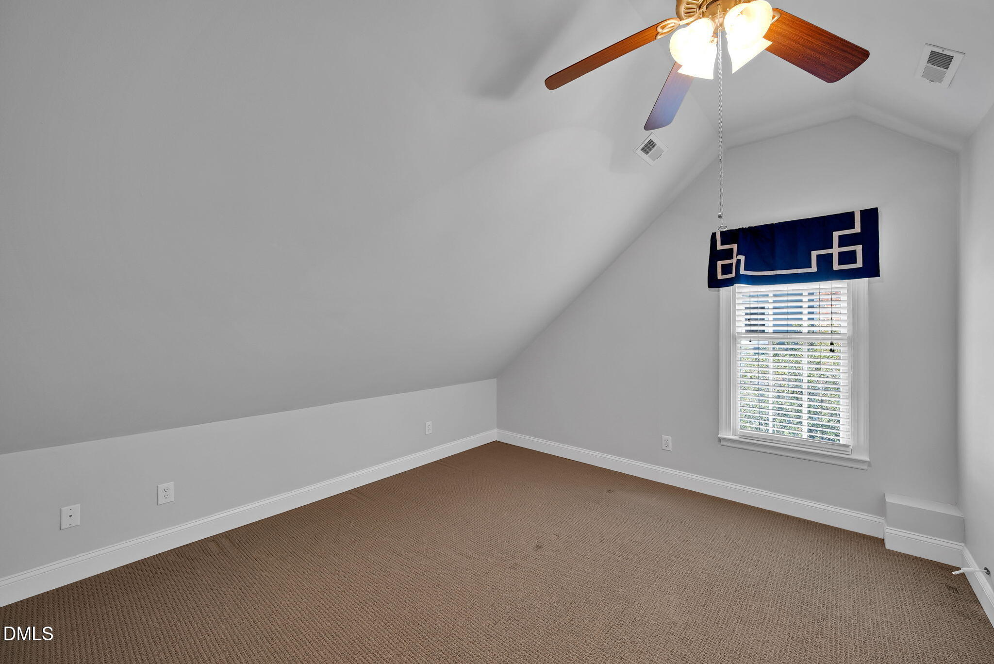 8005 Looking Glass Court Raleigh, NC 27612 - Photo 29 of 75 an empty room with windows